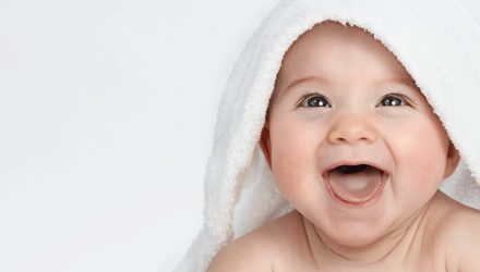 Cute-Smiling-Baby-Under-The-Towel